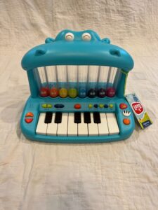 Blue hippo child's piano toy