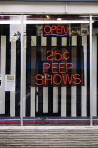 25 cent peep show sign