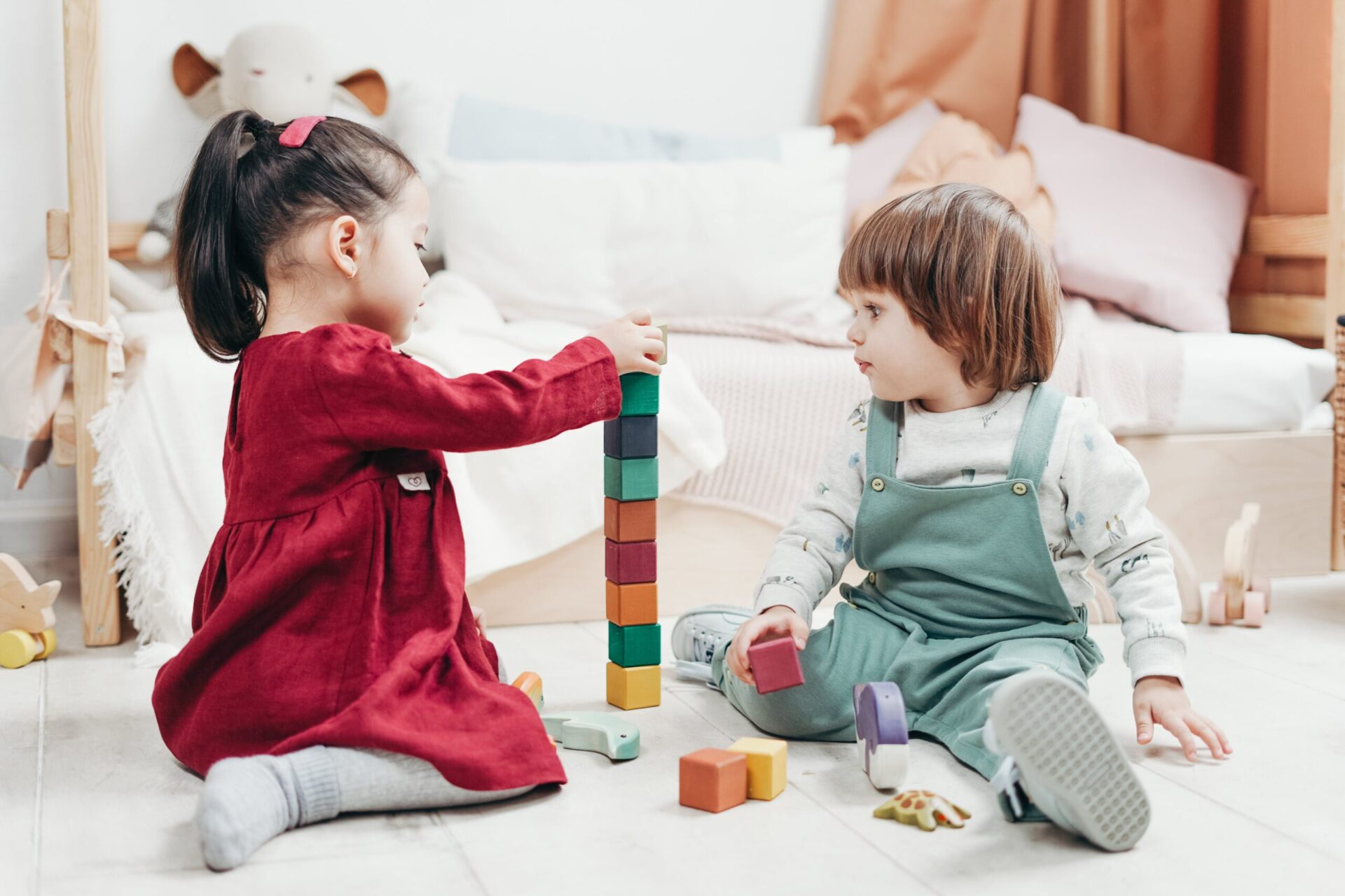 children playing blocks together